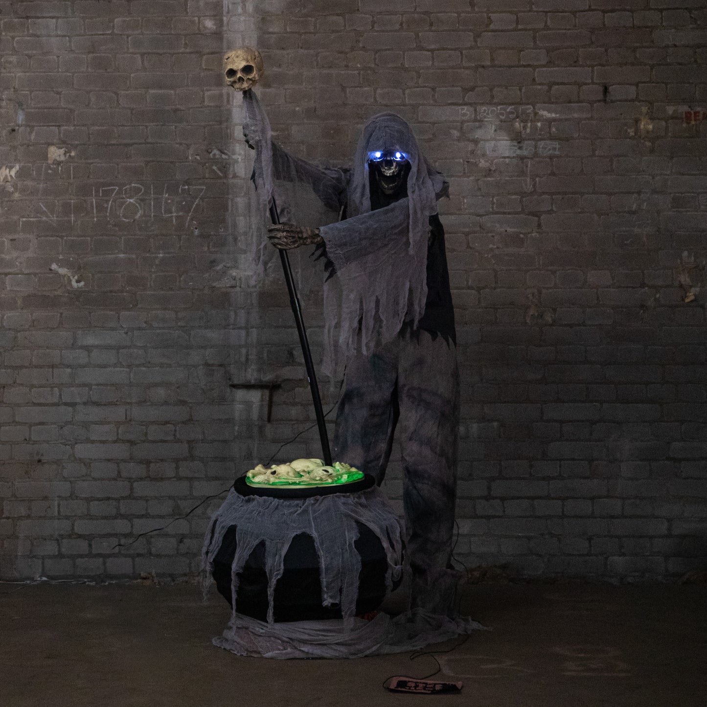 6ft Tall Animated Stirring Cauldron Creep Skeleton Halloween Decoration with LED Eyes