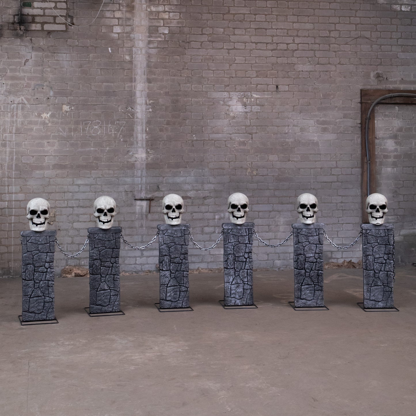 Pack of 2: 90cm x 1.2m Battery Powered Light Up Halloween Skull Fence with LEDs
