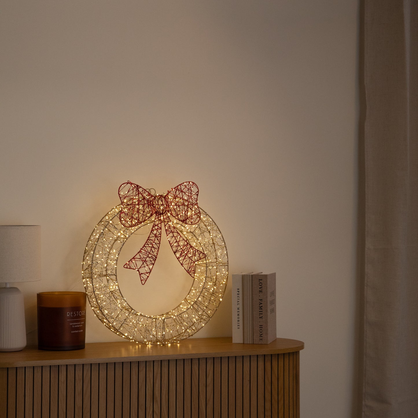 50cm Gold Light Up Christmas Wreath with 600 Warm White LEDs, Timer & Red Bow