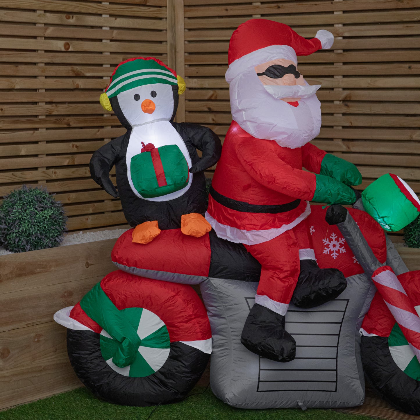 1.8m (6ft) Light up Santa with Penguin on Motorbike Christmas Inflatable with LEDs
