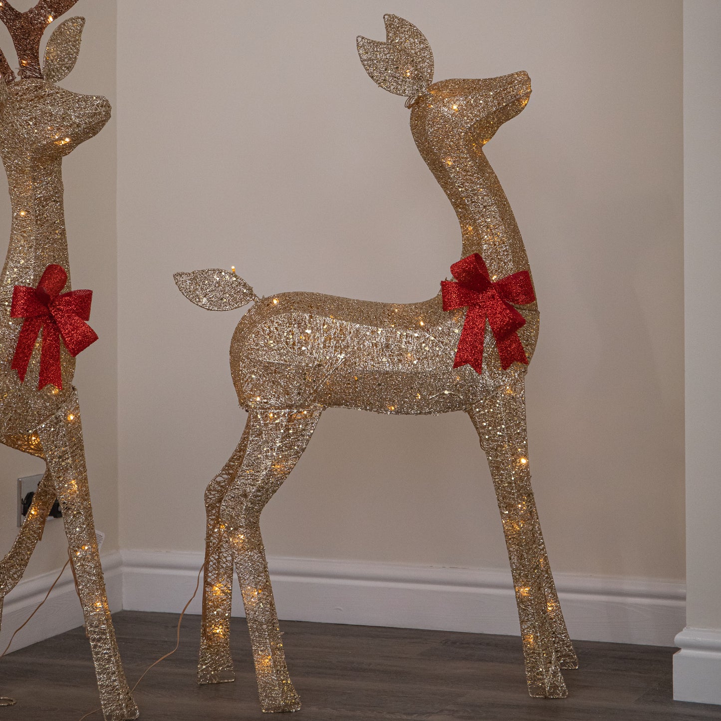 Set of 3 Gold Glitter Light Up Reindeer Family with 210 Warm White LEDs & Timer