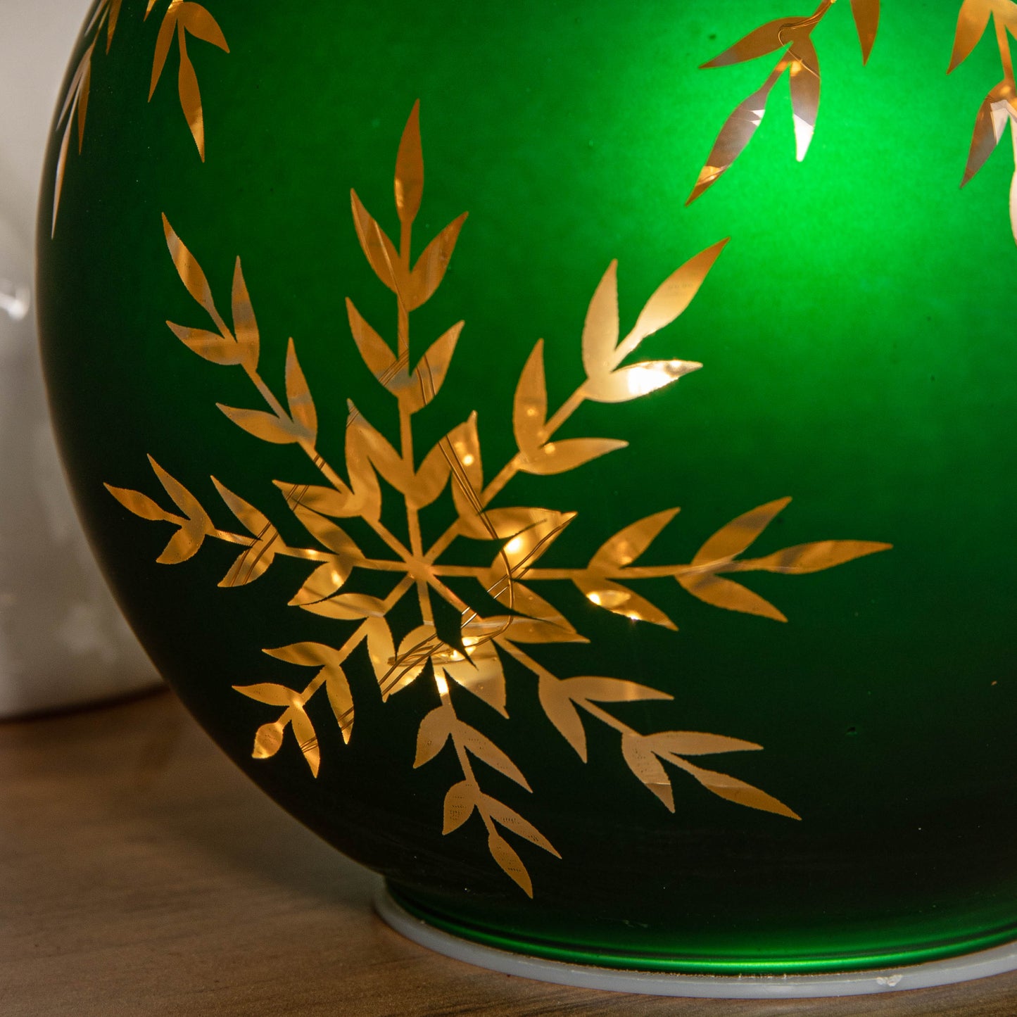 15cm Battery Operated Light up Snowflake Glass Ball in Green with Warm White LEDs