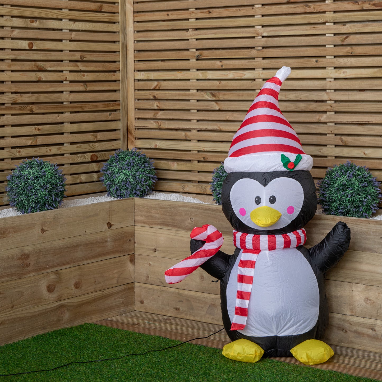 4ft (120cm) LED Christmas Inflatables Outdoor Penguin W/ Candy Cane Decorations