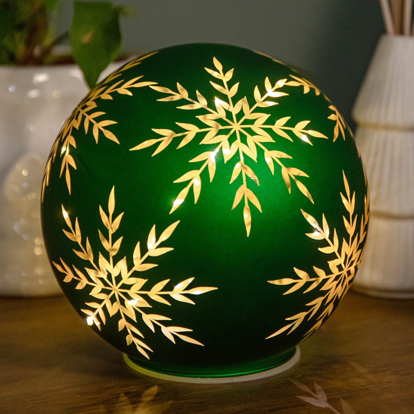 15cm Battery Operated Light up Snowflake Glass Ball in Green with Warm White LEDs