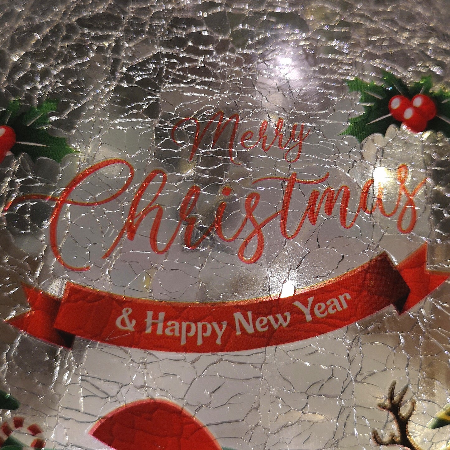 20cm Battery Operated Twinkling Warm White LED Crackle Effect Ball Christmas Decoration with Santa and Friends in Train