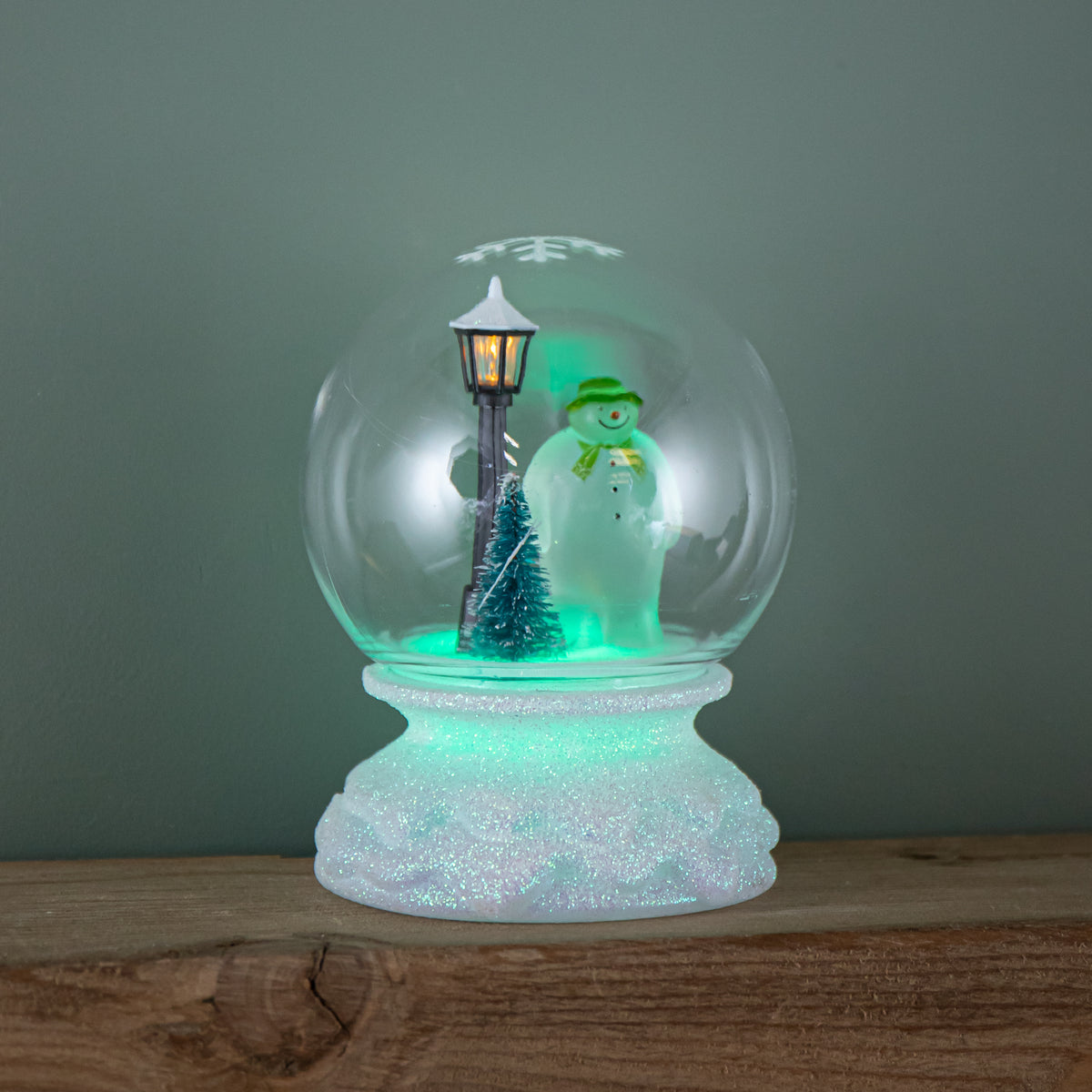 12cm Battery Operated Light up Christmas Snow Globe with The Snowman & Multi-Coloured LEDs
