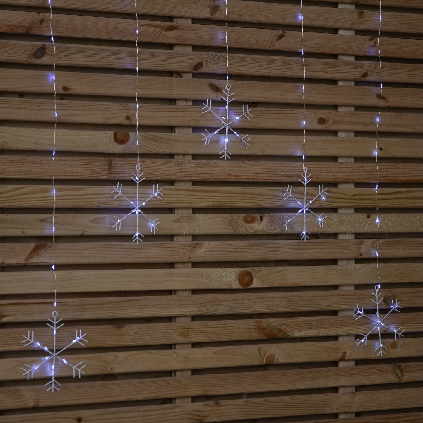 1.2m Battery Operated Snowflake Christmas Curtain Lights with 147 White LEDs