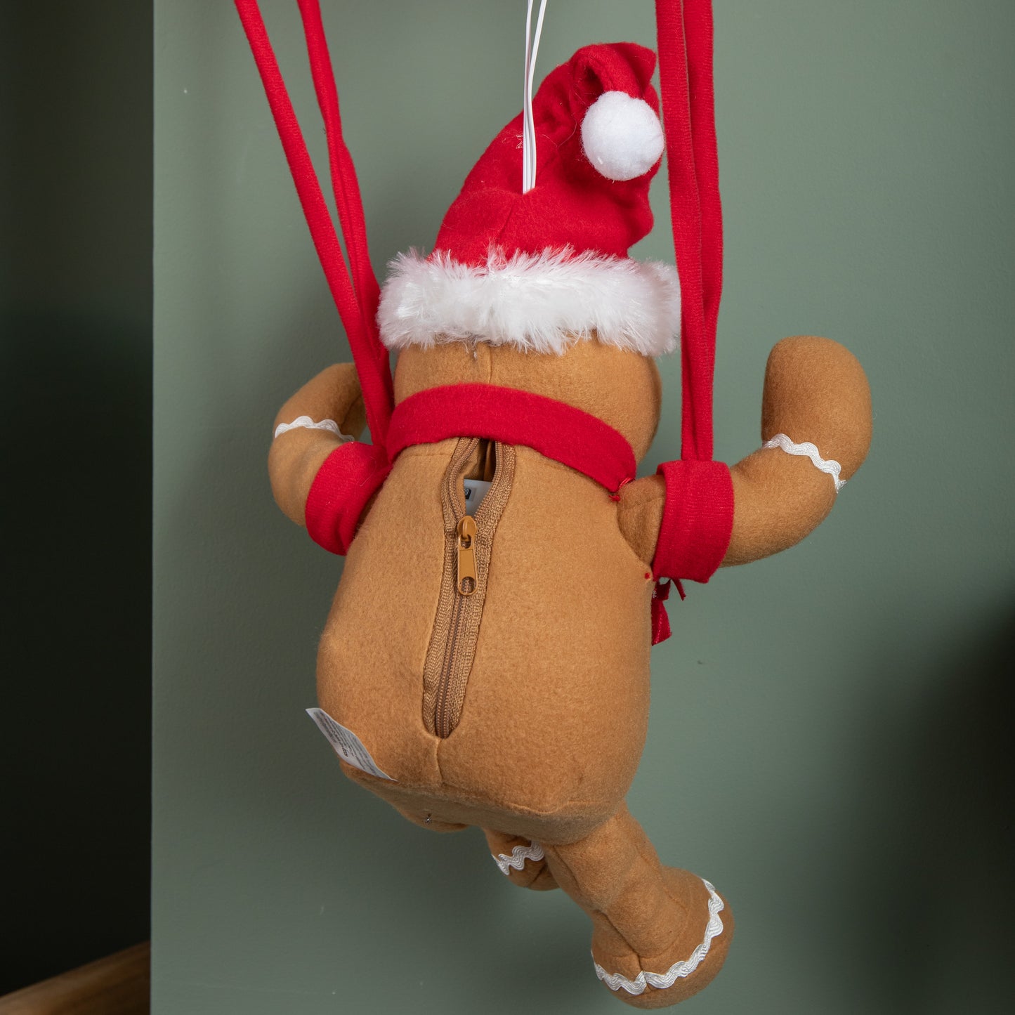 57cm Battery Operated Musical Parachuting Gingerbread Man with Leg Kicking Motion