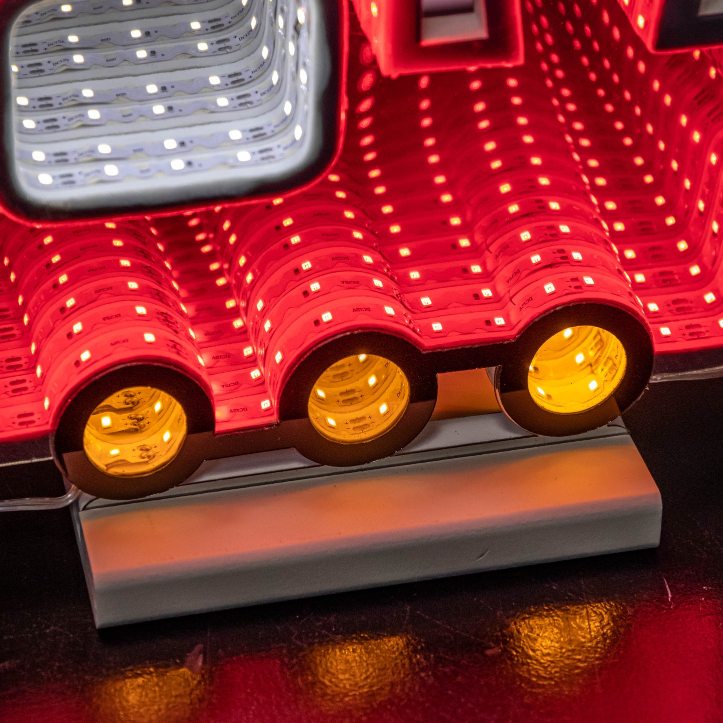 70cm Infinity Christmas Train with 2 Carriages on Wood Base and Multi-Coloured LEDs