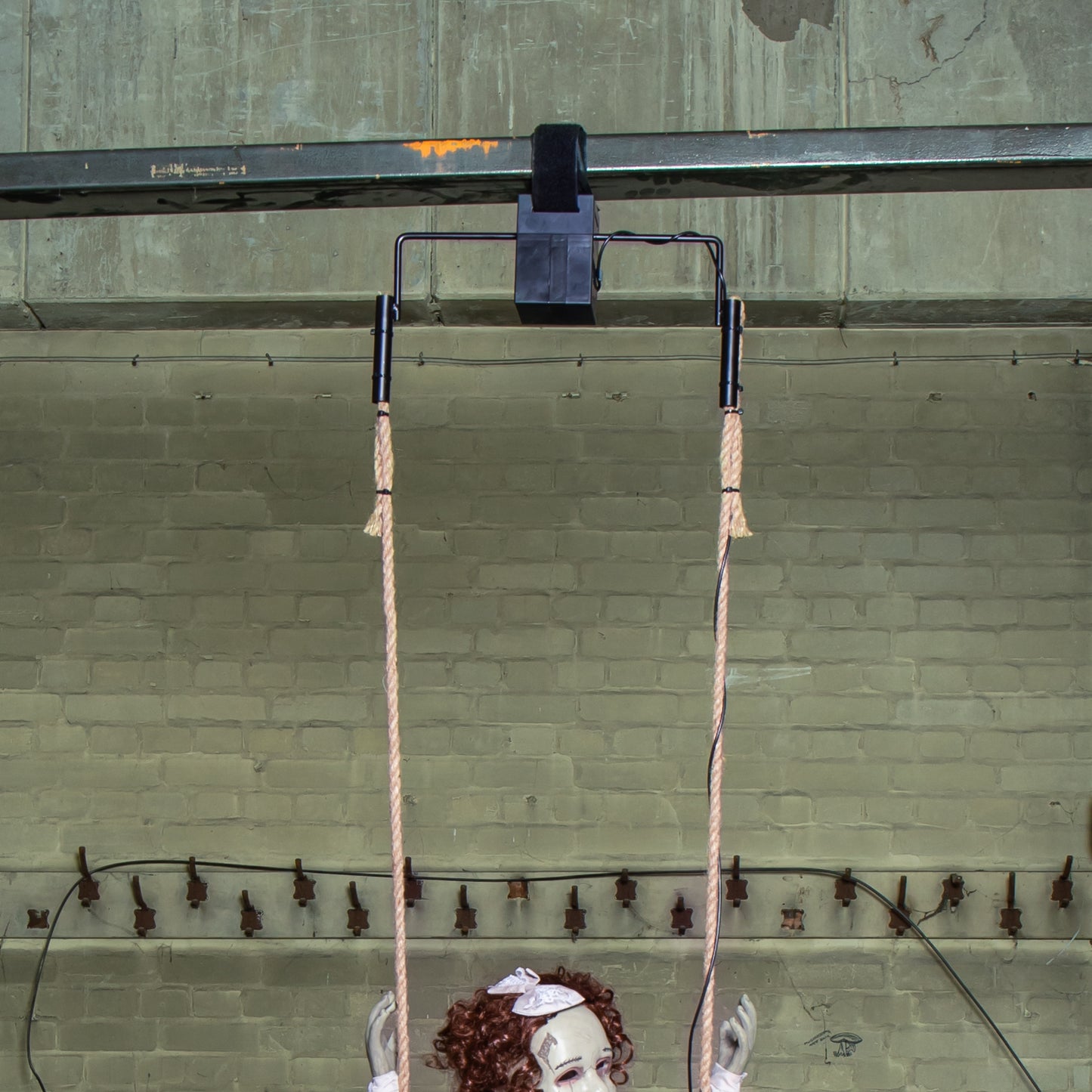 5.5ft Motion Activated Animated Swinging Decrepit Halloween Doll with LEDs