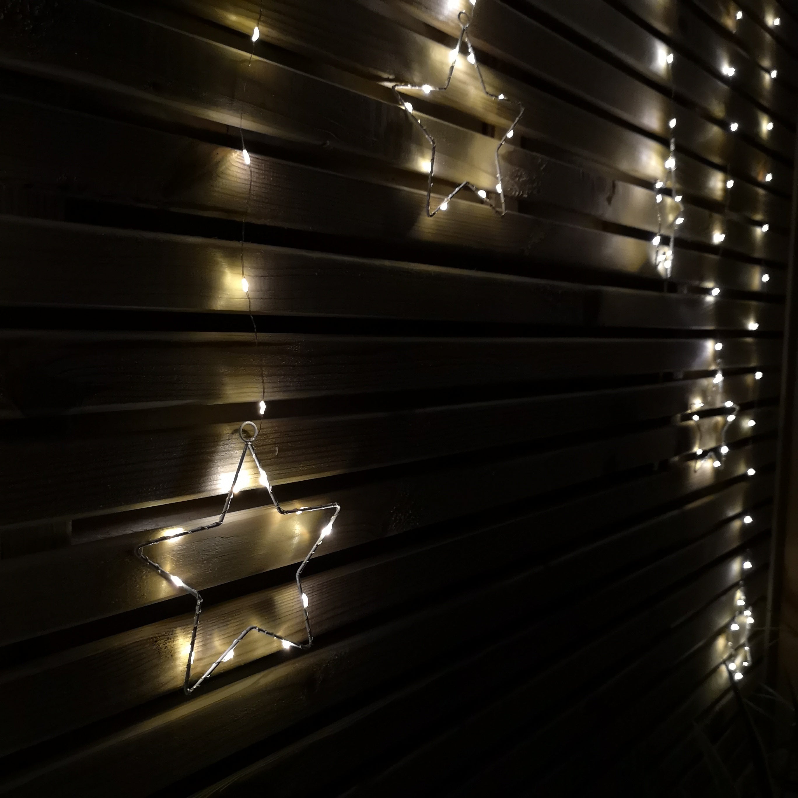 1.2m Battery Operated Christmas Star Curtain Lights with 140 Warm White LEDs