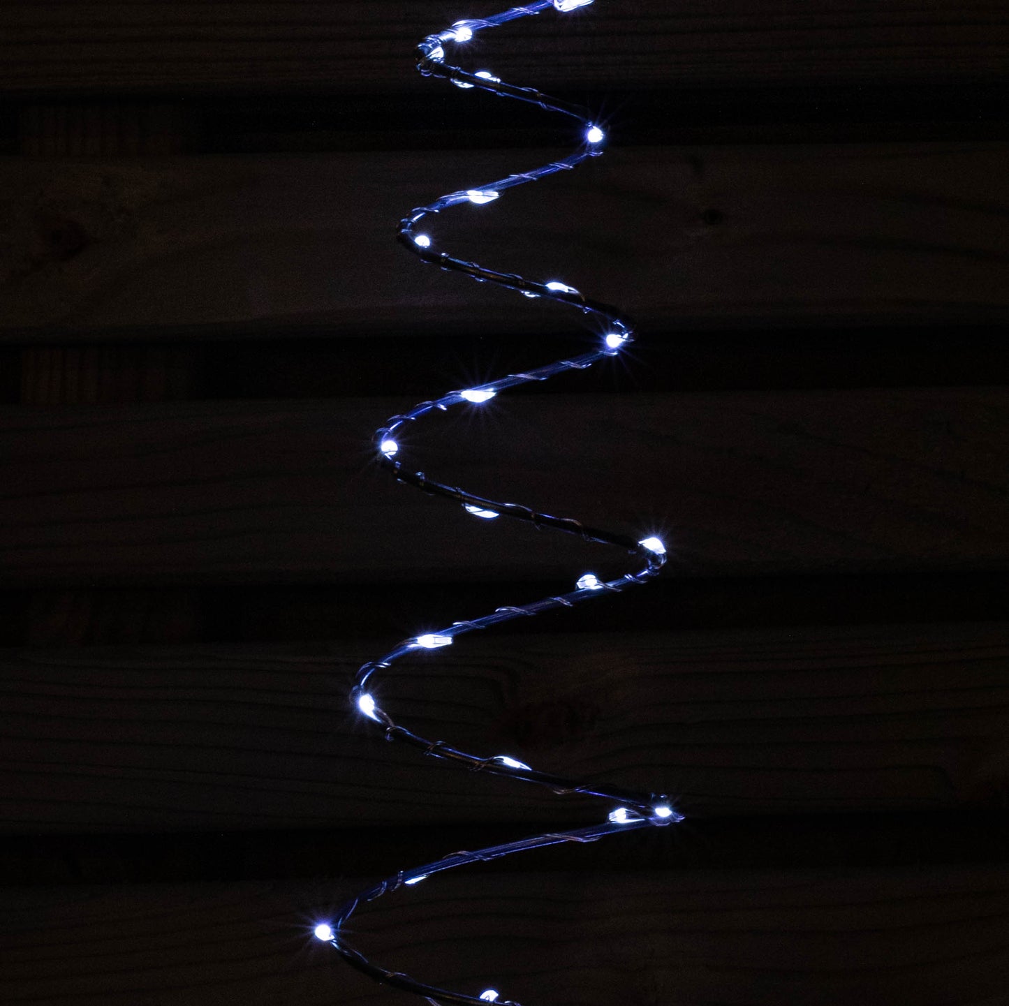 30cm Set of 4 Light up Silver Spiral Shaped Christmas Tree Garden Path Lights with 200 White LEDs