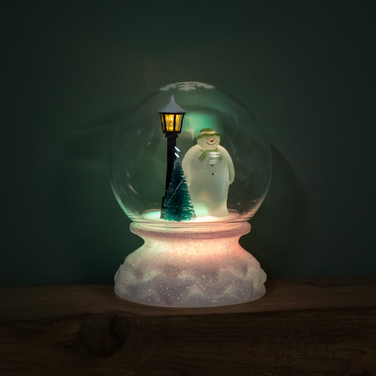 12cm Battery Operated Light up Christmas Snow Globe with The Snowman & Multi-Coloured LEDs