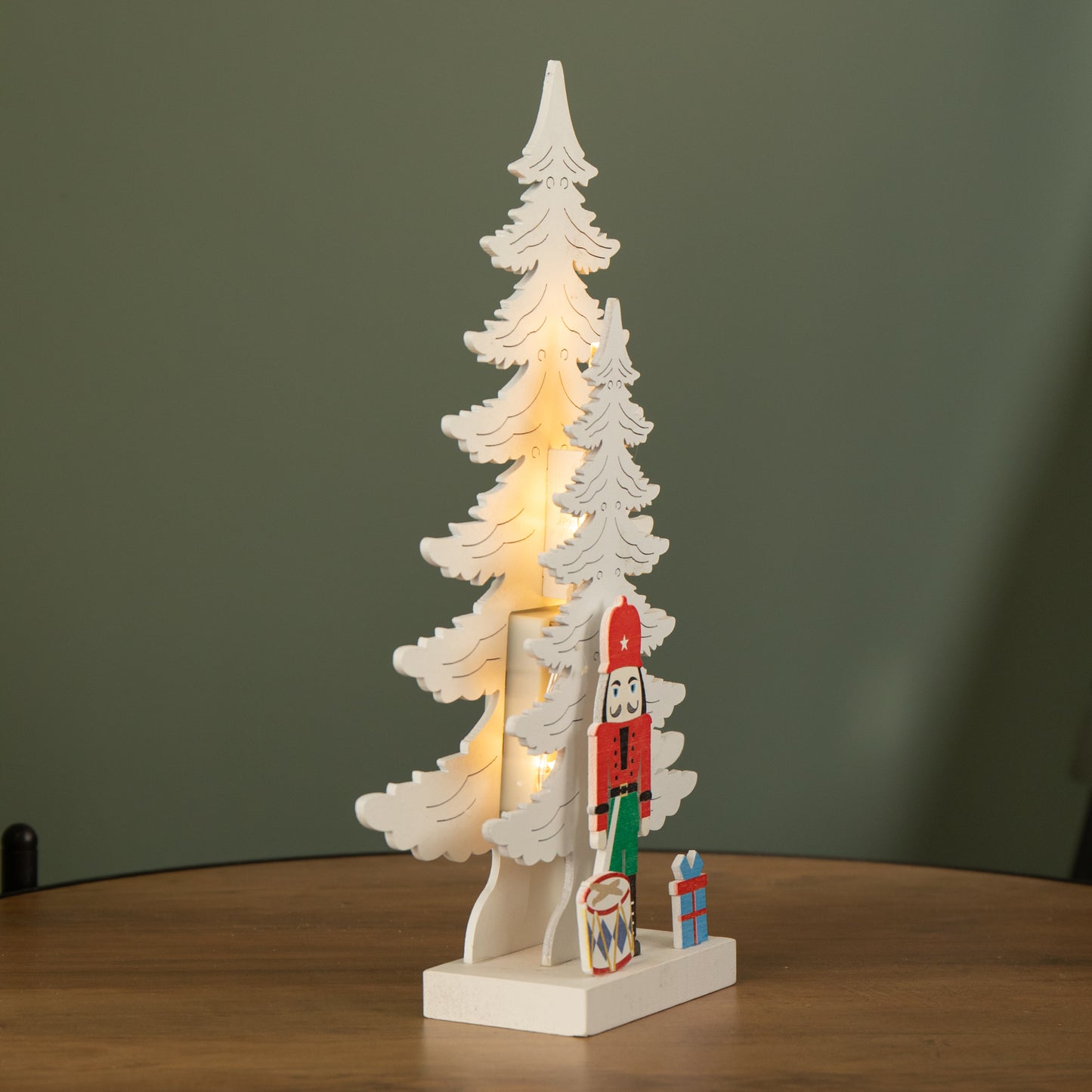 25cm LED Battery Operated Nutcracker with White Wooden Christmas Tree Scene