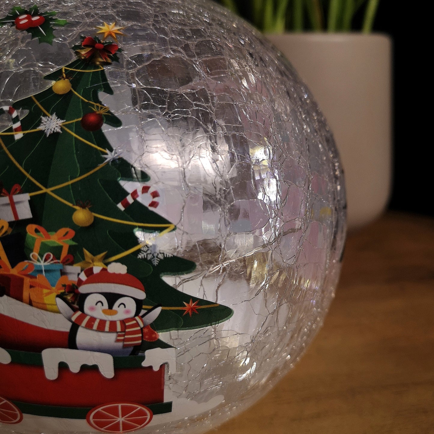 15cm Battery Operated Twinkling Warm White LED Crackle Effect Ball Christmas Decoration with Santa and Friends in Train