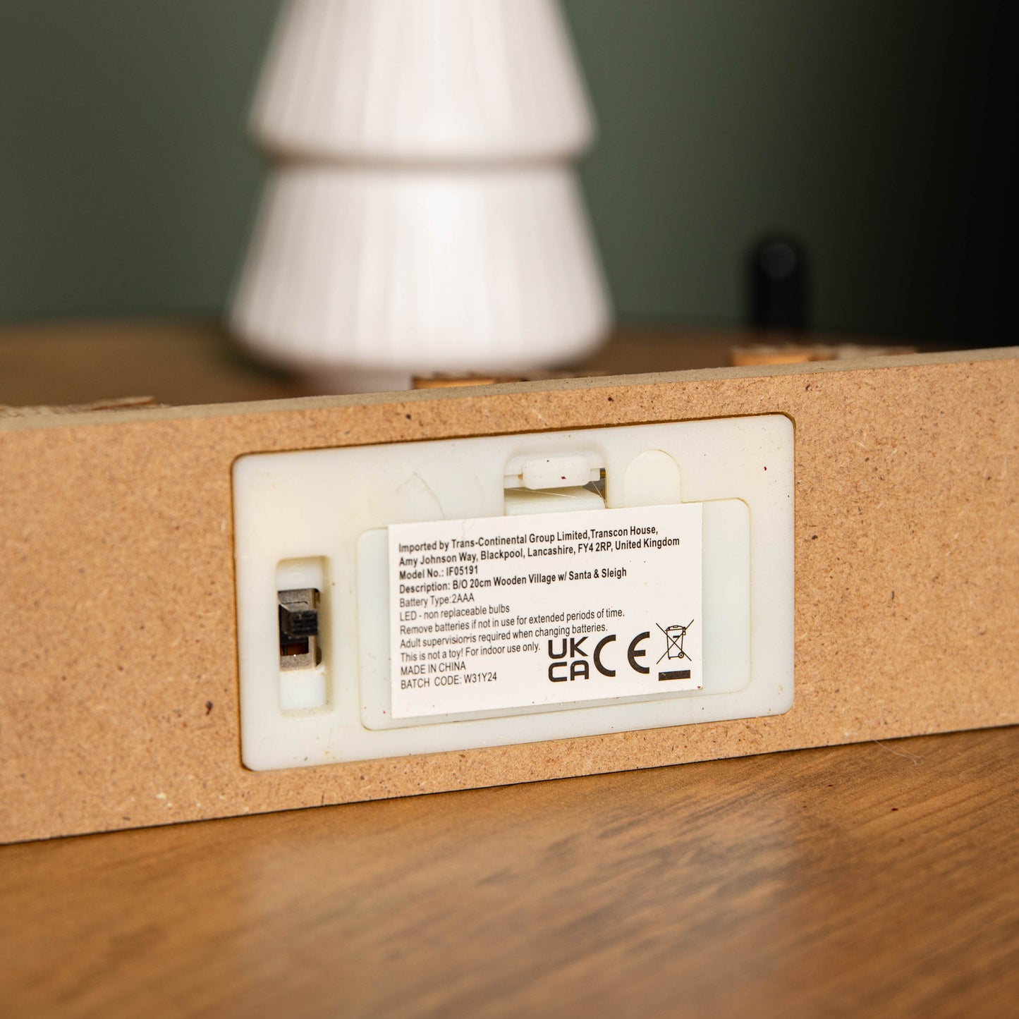 20cm Battery Operated Light up Wooden Village with Santa in Sleigh and Warm White LEDs