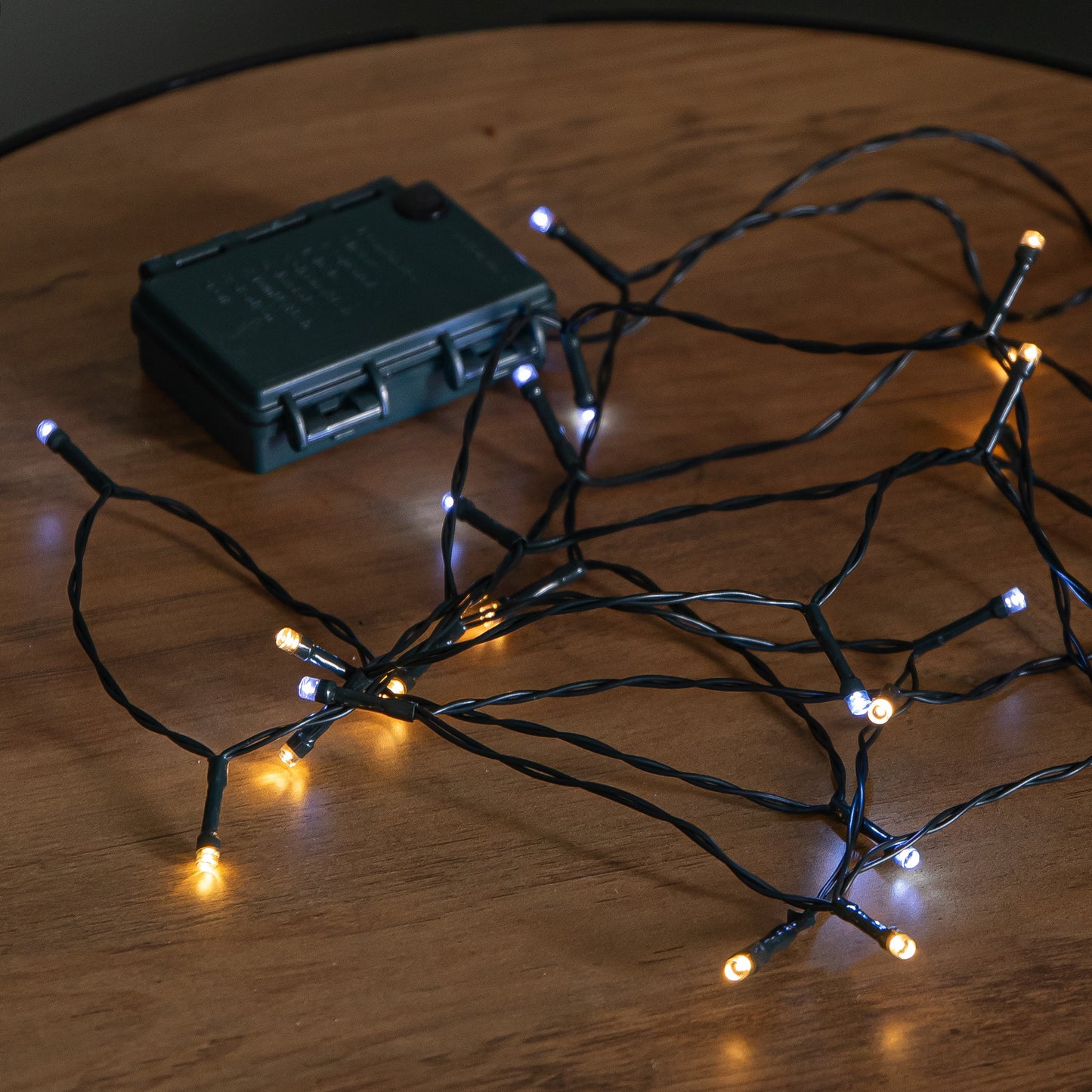 60m Battery Operated Multi-Action Christmas String Lights with 600 Cool & Warm White LEDs