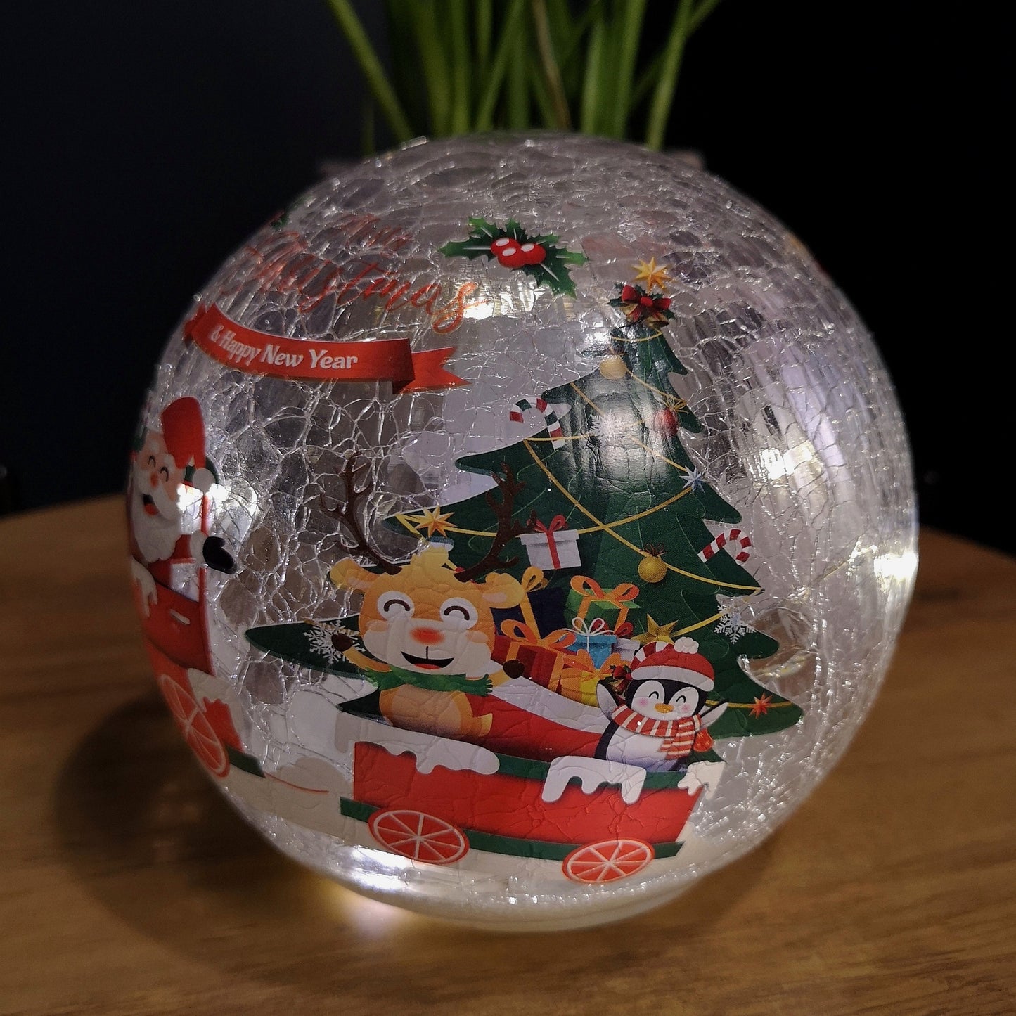 15cm Battery Operated Twinkling Warm White LED Crackle Effect Ball Christmas Decoration with Santa and Friends in Train