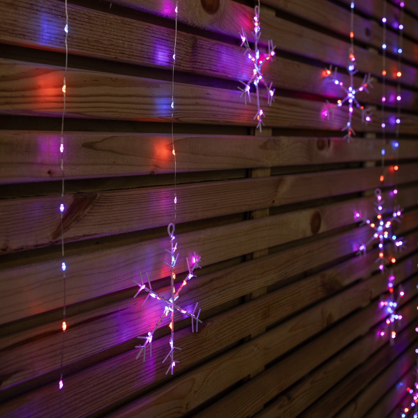 1.2m Premier Christmas Static Snowflake LED Silver Pin Wire V Curtain Lights in Rainbow