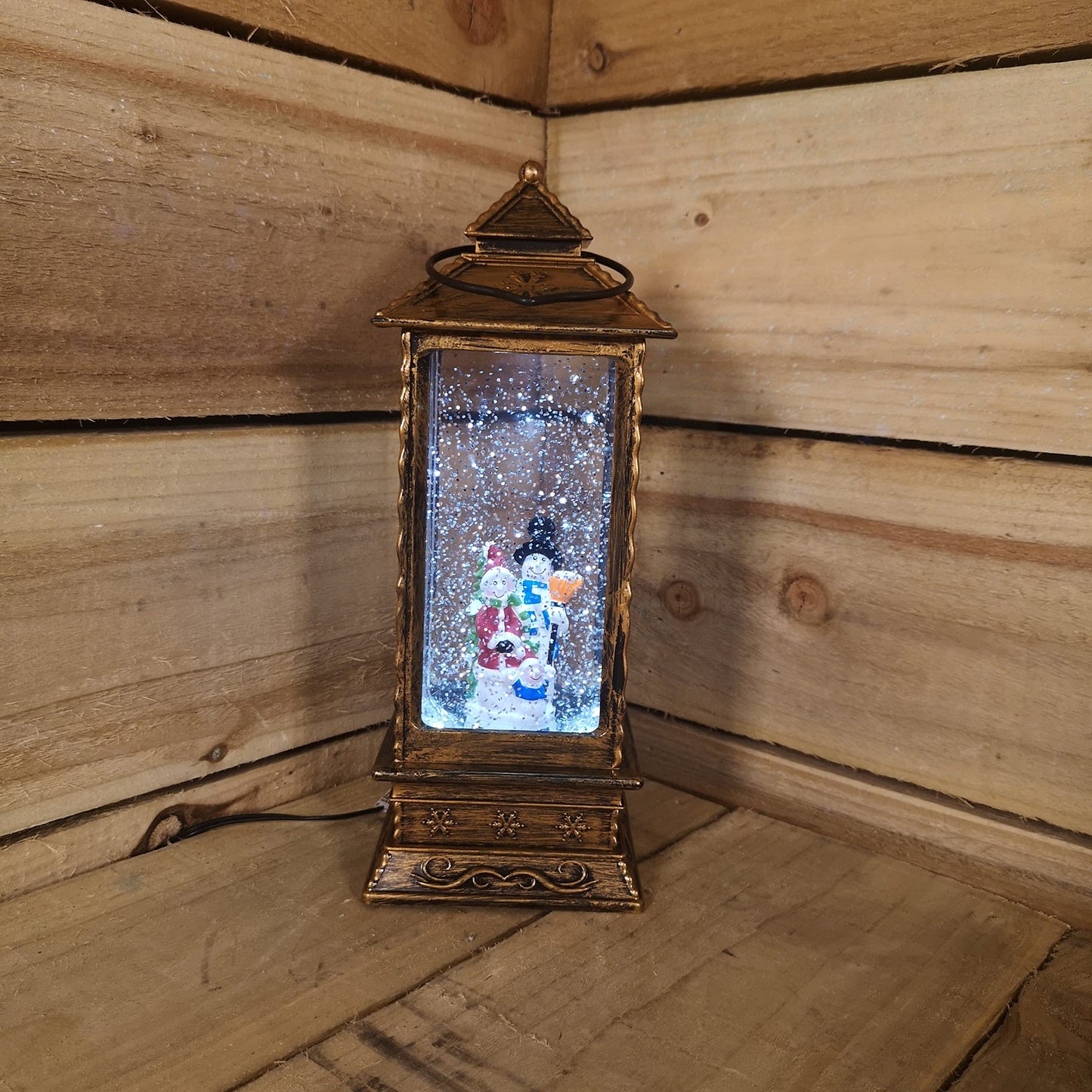 27cm Premier Christmas Dual Powered Water Spinner Antique Effect Lantern with Snowman Scene