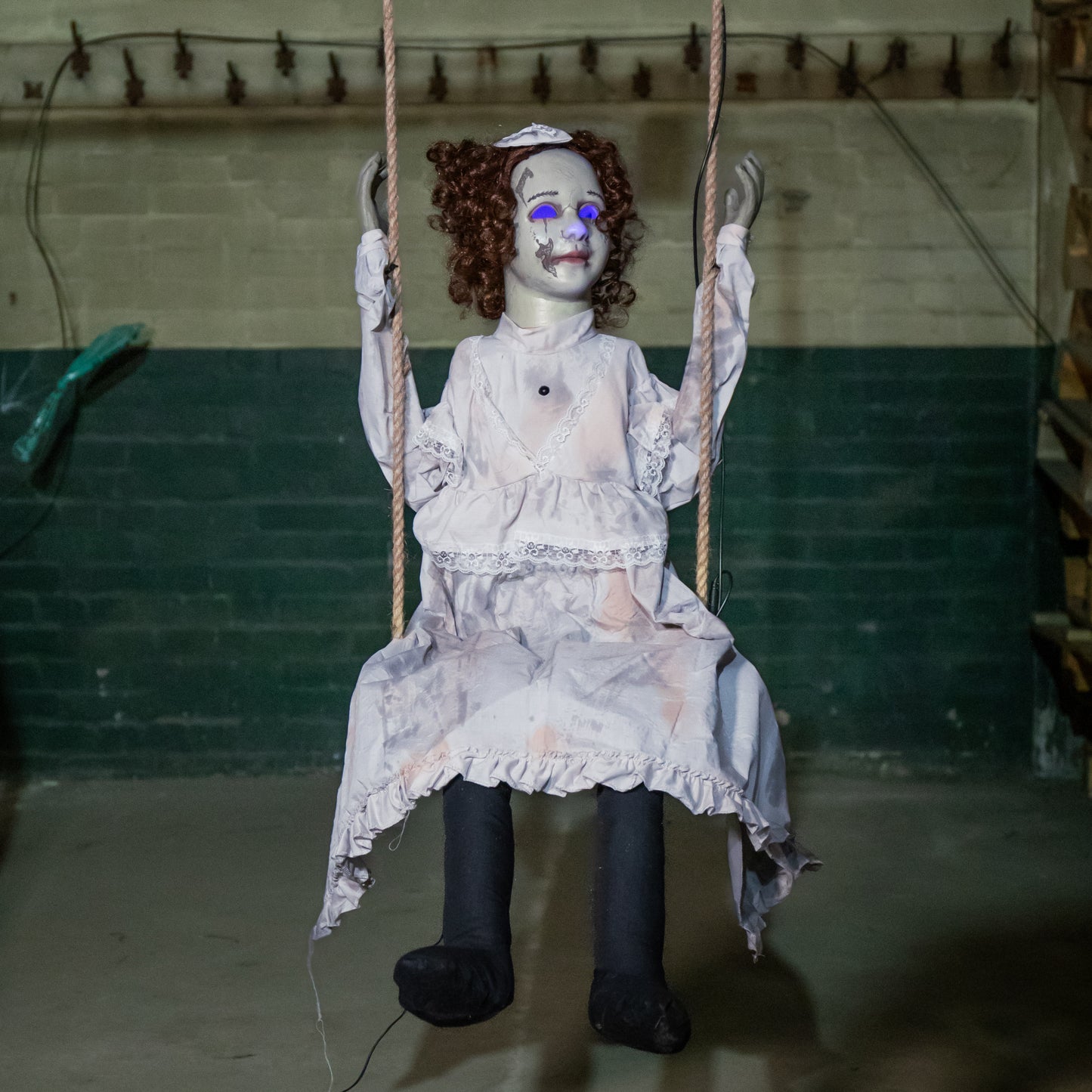 5.5ft Motion Activated Animated Swinging Decrepit Halloween Doll with LEDs