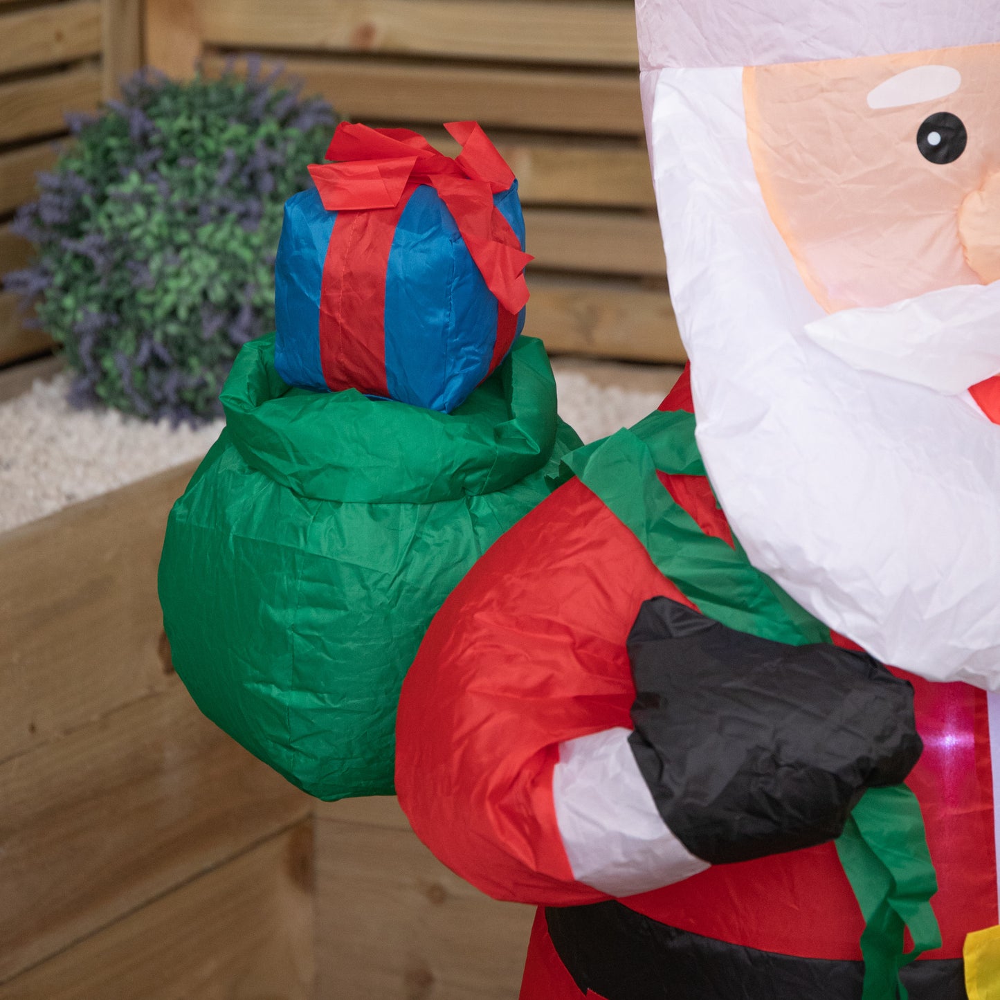 130cm (4ft) Inflatable LED Outdoor Christmas Standing Santa with Gift in Sack