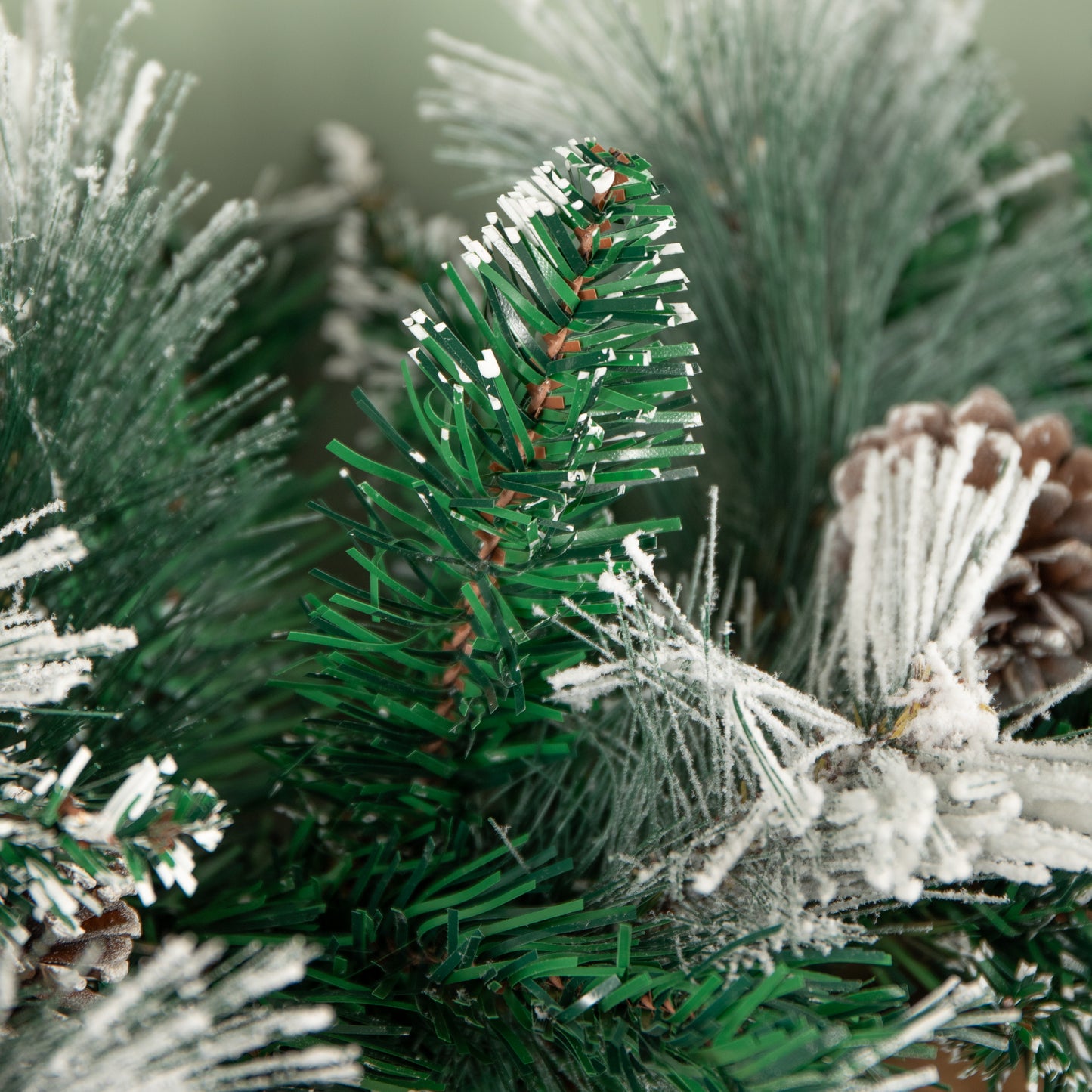 2.7m Snow Flocked Christmas Garland with Pine Cones and Mixed Needles