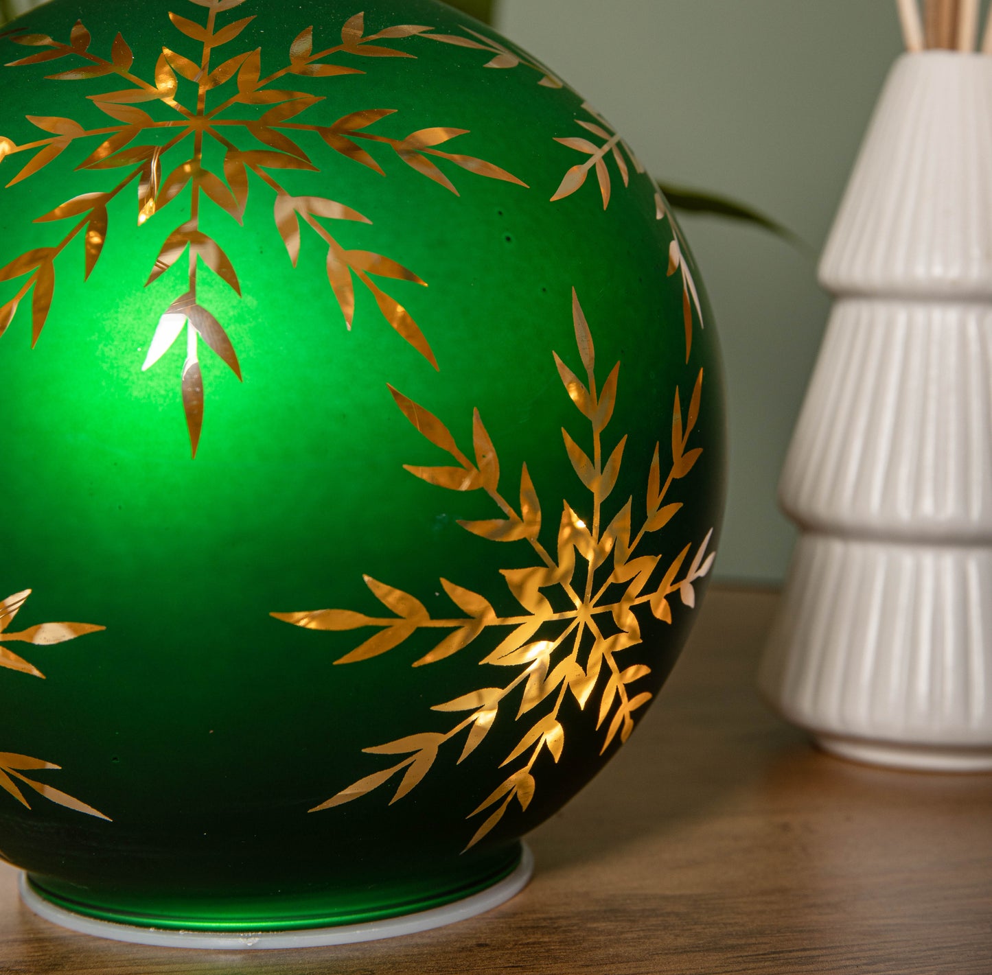 15cm Battery Operated Light up Snowflake Glass Ball in Green with Warm White LEDs