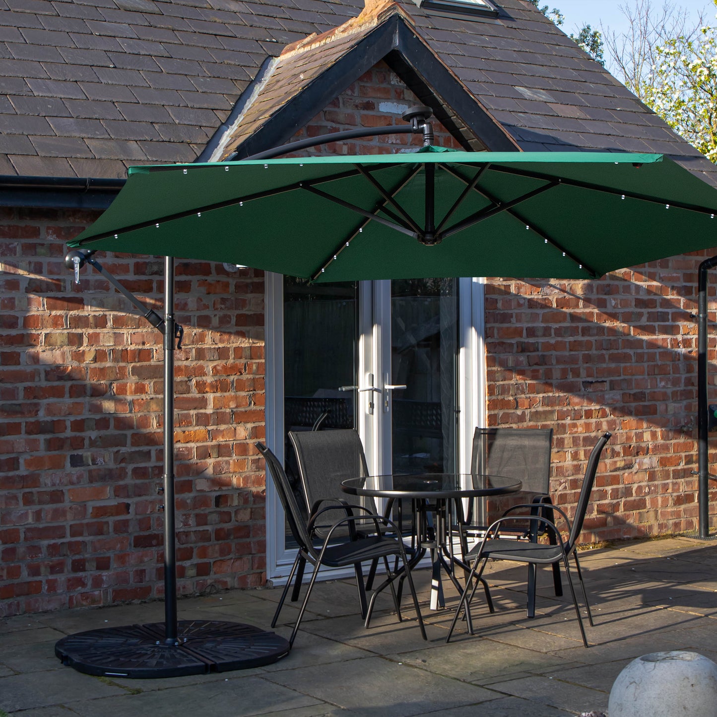 Outdoor 4 Person Round Glass Top Garden Dining Table Chairs With Green Banana Lit Parasol and Base