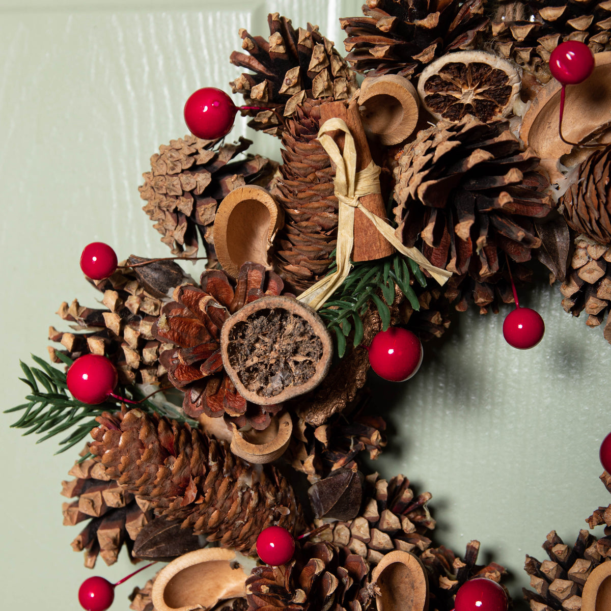 30cm Winter Spice Hanging Christmas Wreath with Pine Cones Red Berries & Dried Fruit