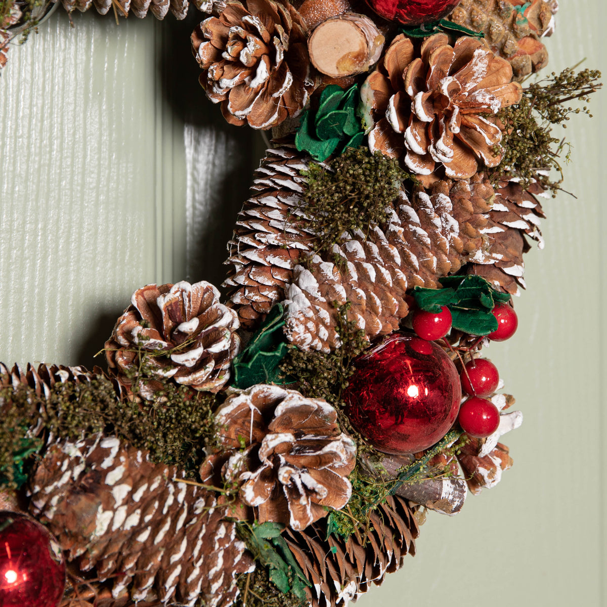 36cm Hanging Christmas YuleFest Wreath with Red Baubles & Snow Tipped Pine Cones