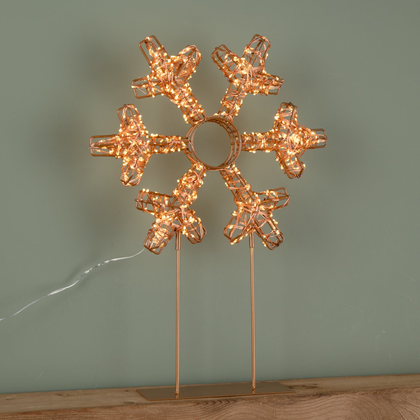 45cm Light up Rose Gold Christmas Snowflake on Metal Stand with Twinkling Warm White LEDs