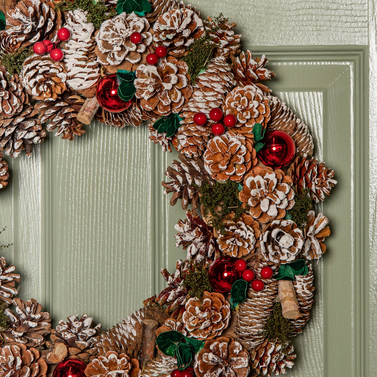50cm Hanging Christmas YuleFest Wreath with Red Baubles & Snow Tipped Pine Cones