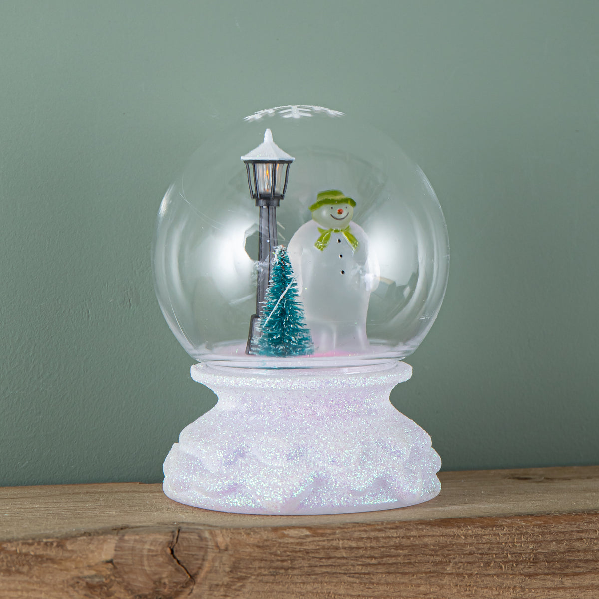 12cm Battery Operated Light up Christmas Snow Globe with The Snowman & Multi-Coloured LEDs