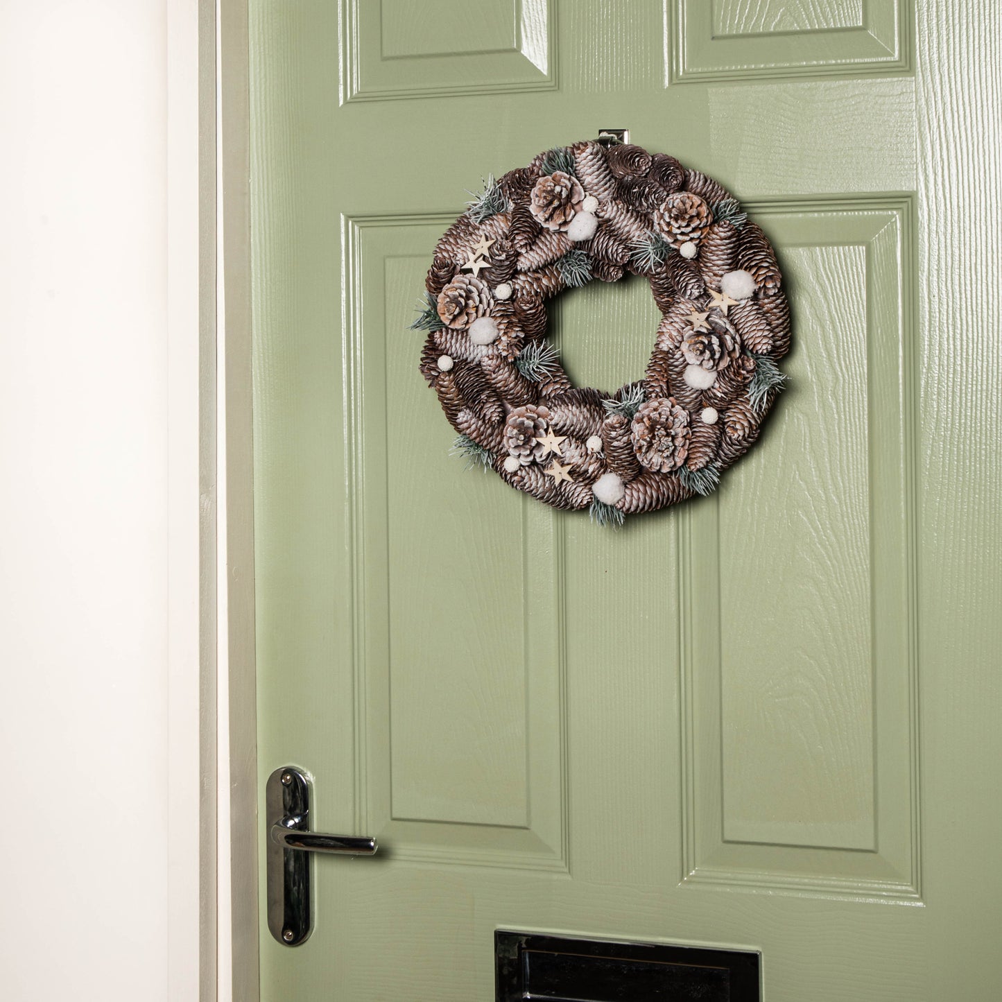 36cm Frosted Hanging Christmas Wreath with Pine Cones & Wooden Stars