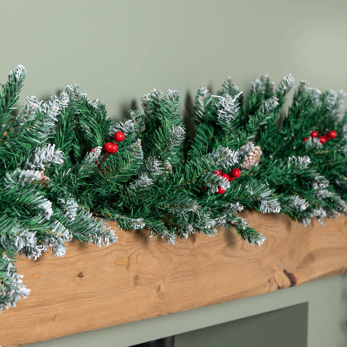 2.7m Snow Tipped Christmas Garland with Red Berries, Cones & Bullet Tips