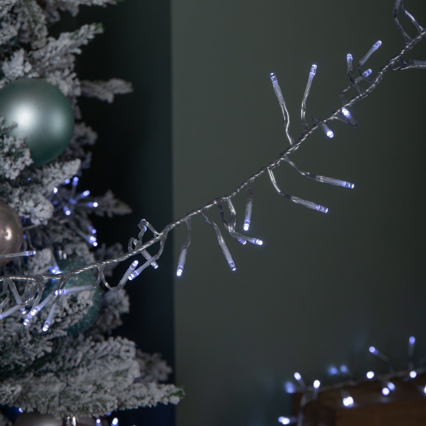 9.3m 720 LED Christmas Cluster String Lights with Timer in White on Clear Cable