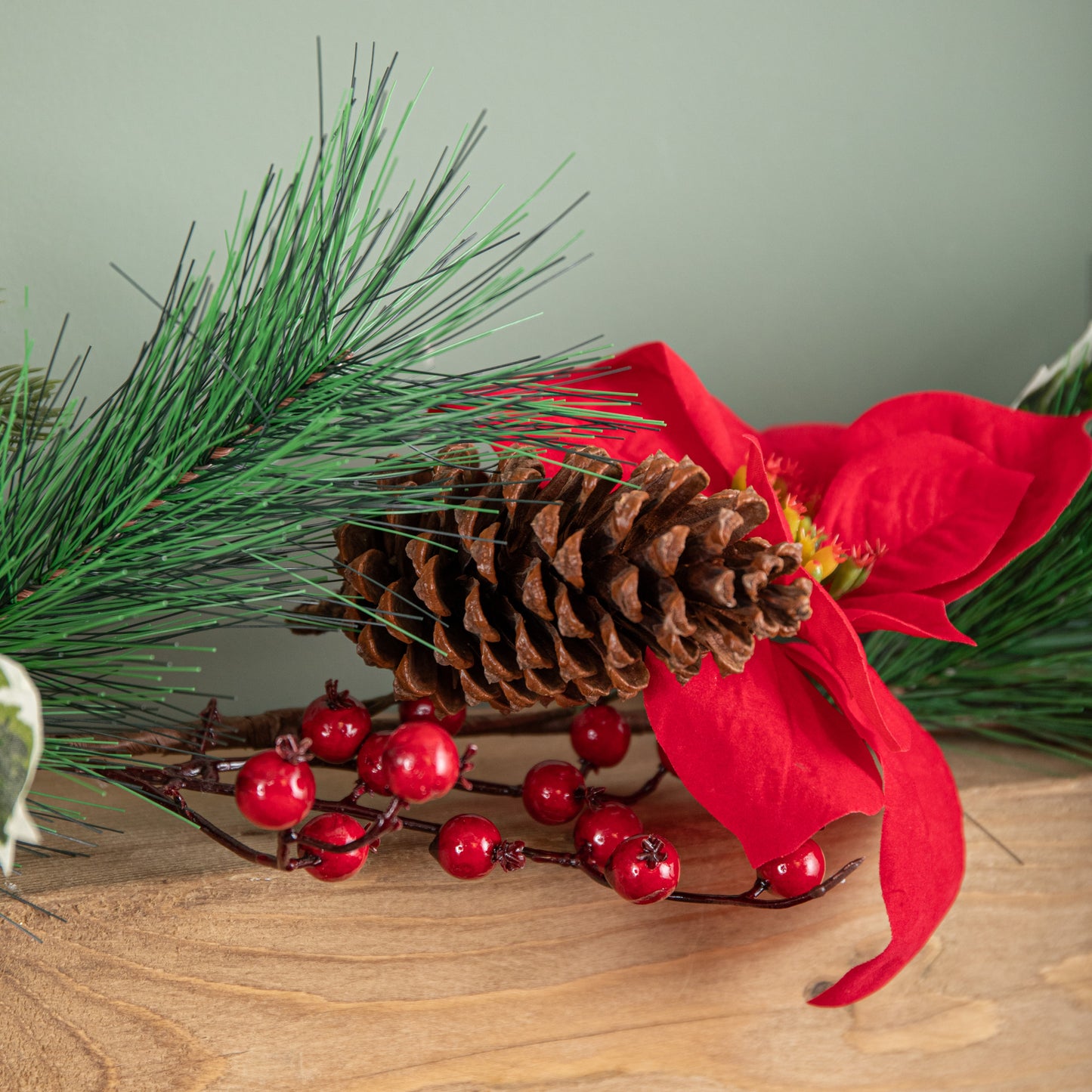 1.8m Red and Green Christmas Poinsettia Garland with Pinecones & Seasonal Foliage