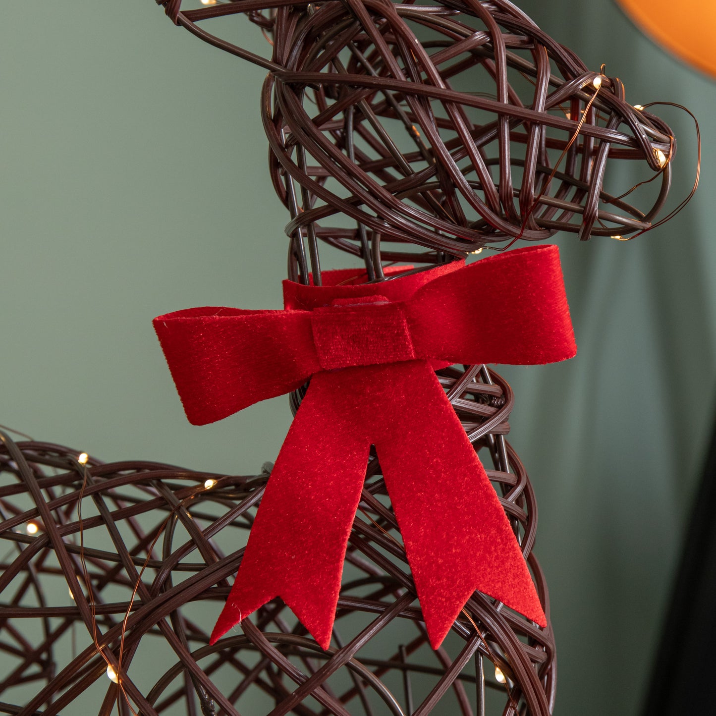 60cm Battery Operated Light up Christmas Reindeer with Red Bow & Warm White LEDs