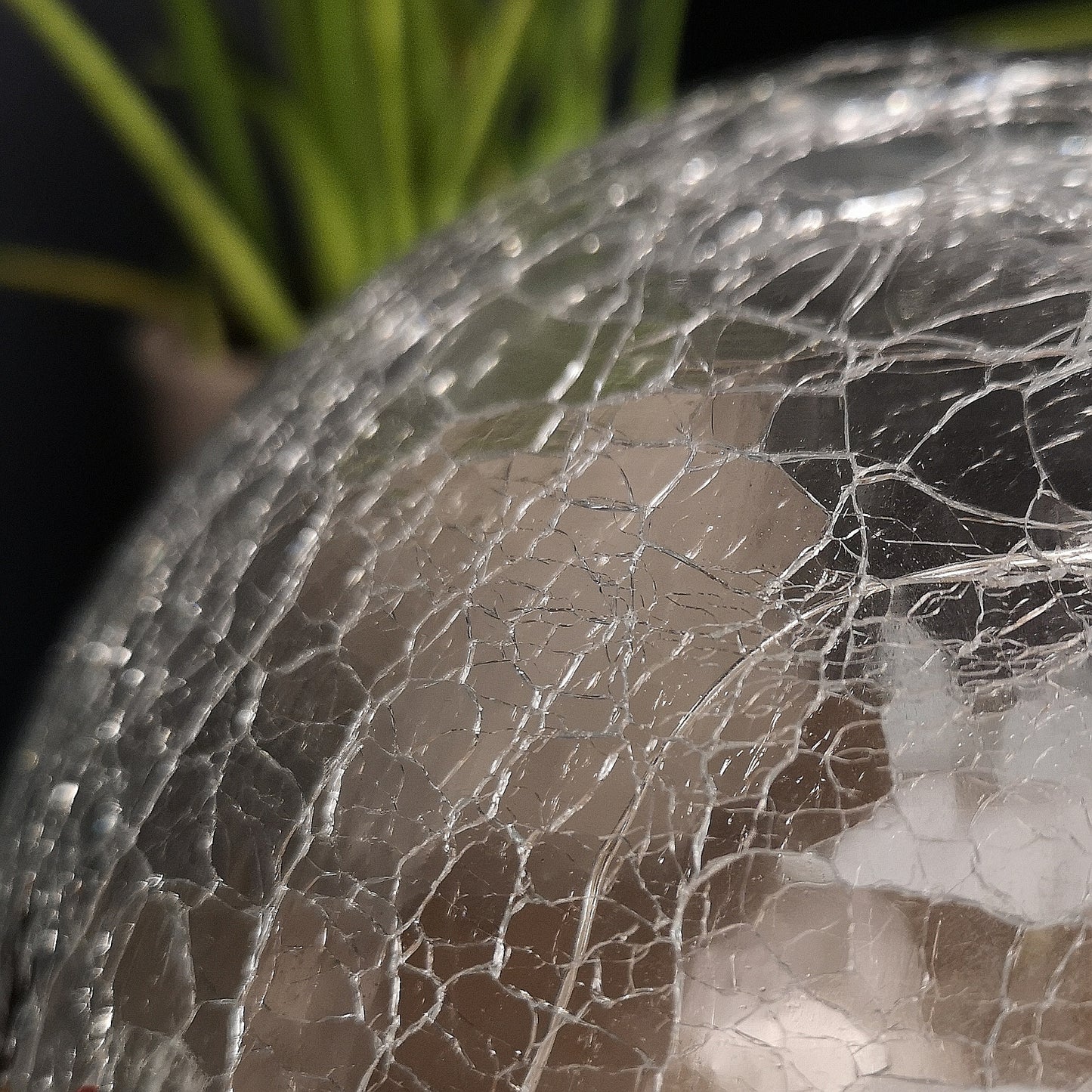 20cm Battery Operated Twinkling Warm White LED Crackle Effect Ball Decoration with Santa and Friends in Car