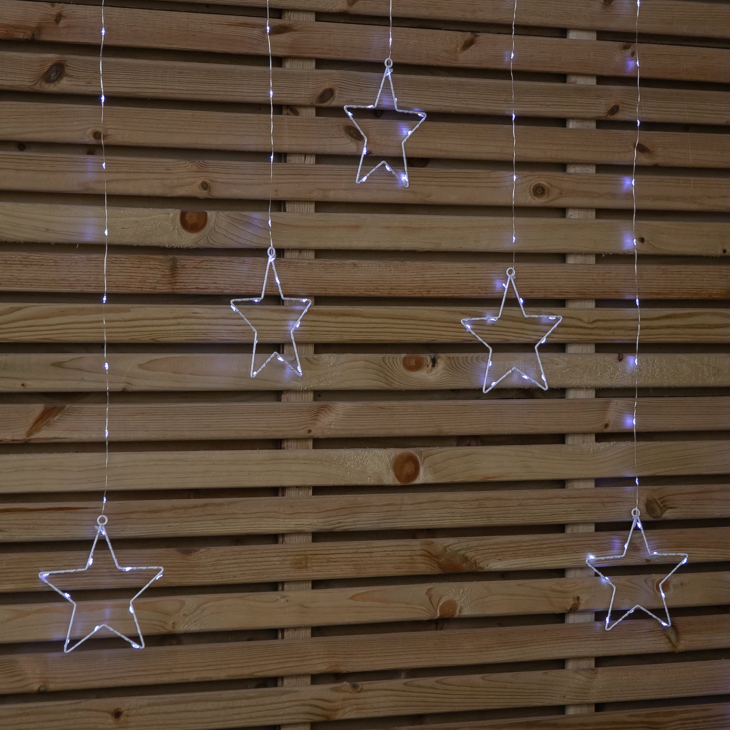 1.2m Battery Operated Christmas Star Curtain Lights with 140 White LEDs