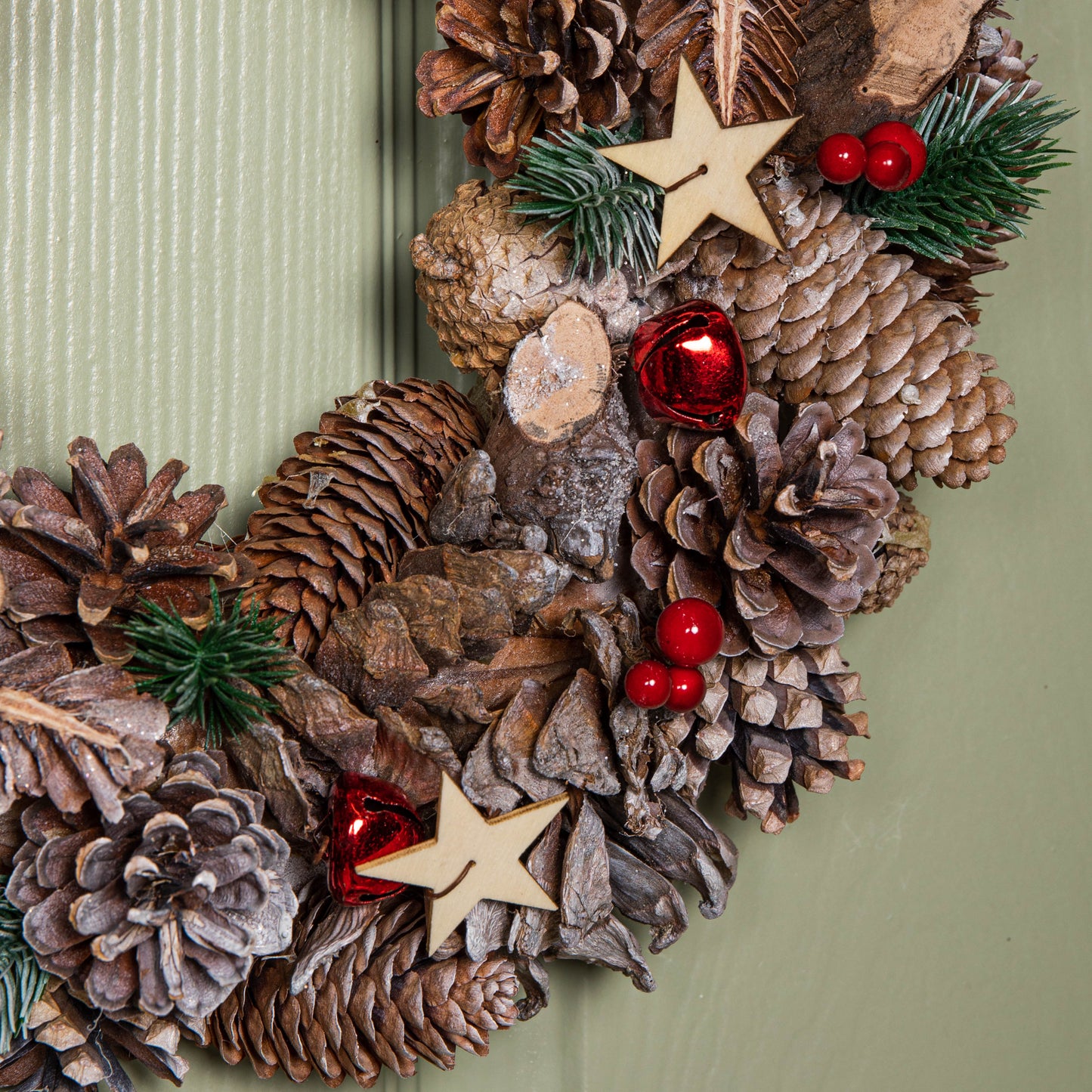 36cm Frosted Hanging Christmas Wreath with Red Jingle Bells & Wooden Stars