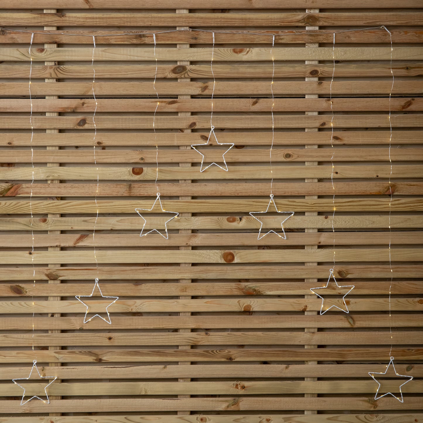 1.2m Battery Operated Star Christmas Curtain Lights with 140 Warm White LEDs