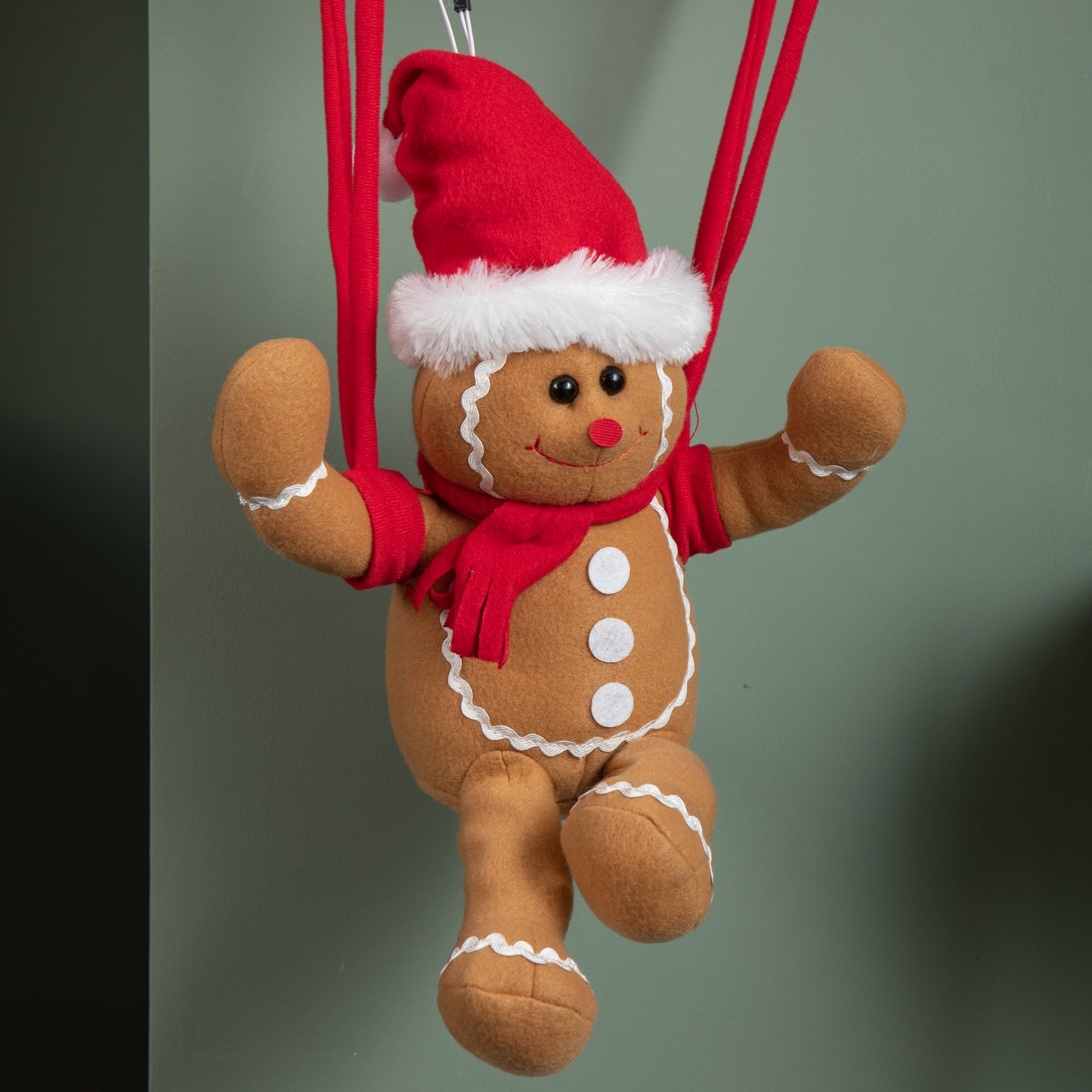 57cm Battery Operated Musical Parachuting Gingerbread Man with Leg Kicking Motion