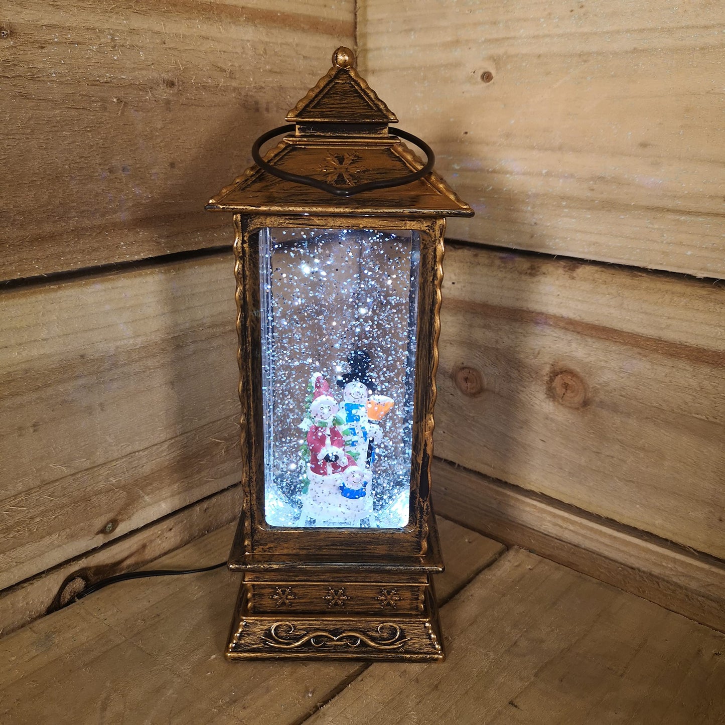 27cm Premier Christmas Dual Powered Water Spinner Antique Effect Lantern with Snowman Scene