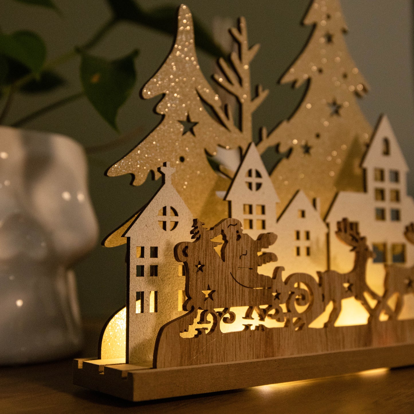20cm Battery Operated Light up Wooden Village with Santa in Sleigh and Warm White LEDs