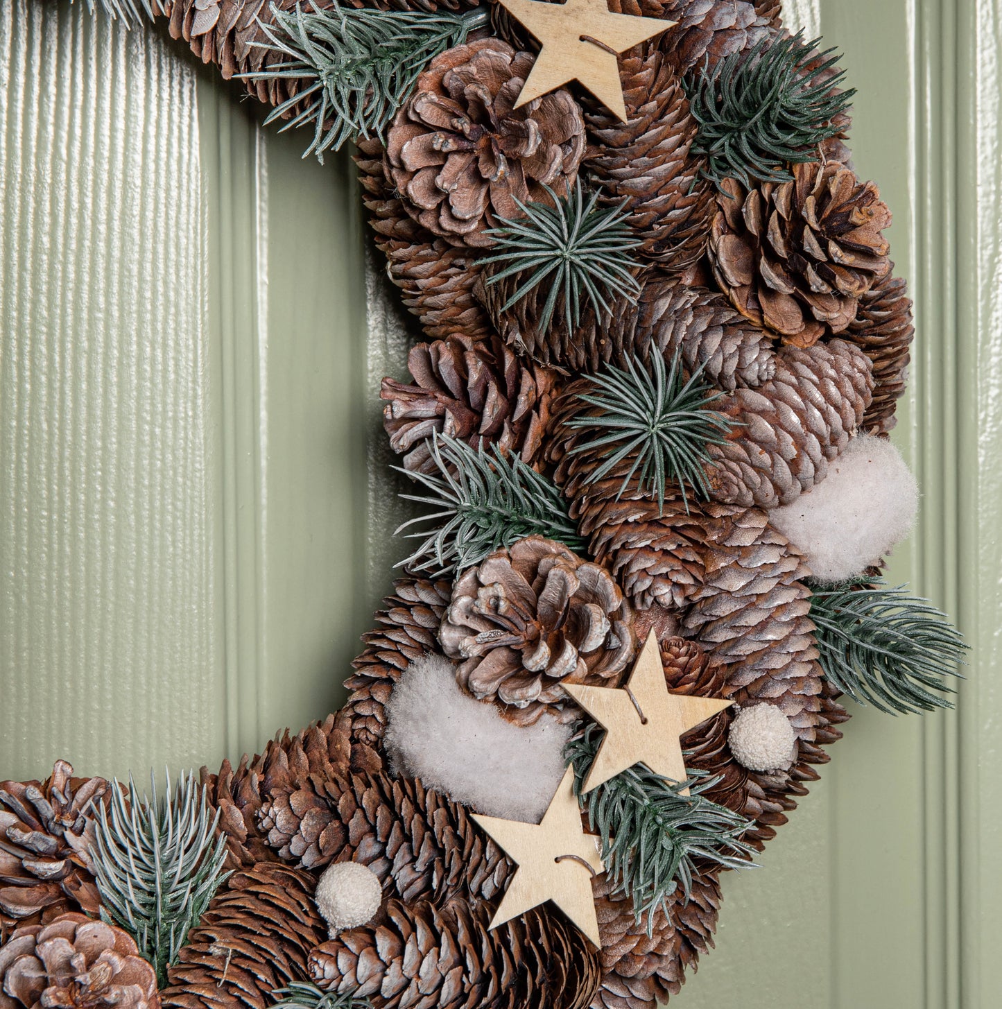 50cm Frosted Hanging Christmas Wreath with Pine Cones & Wooden Stars