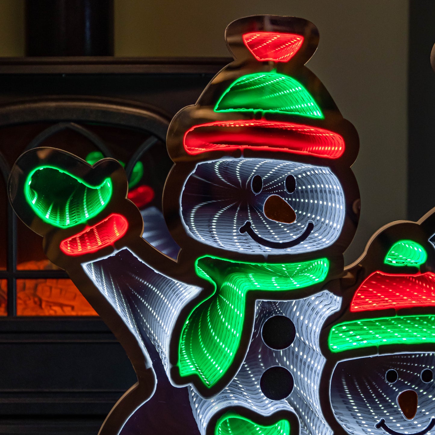 65cm Infinity Standing Snowmen Family on Metal Base with White, Red & Green LEDs