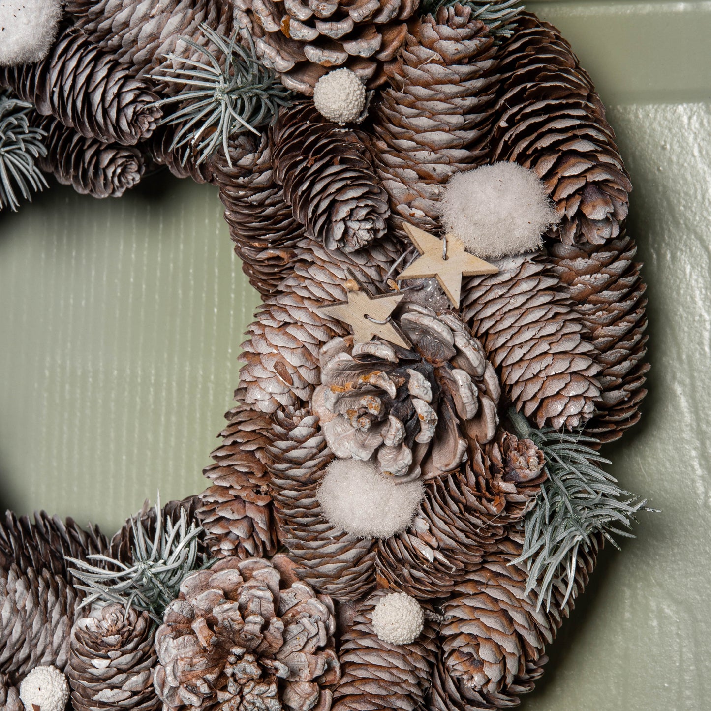 36cm Frosted Hanging Christmas Wreath with Pine Cones & Wooden Stars