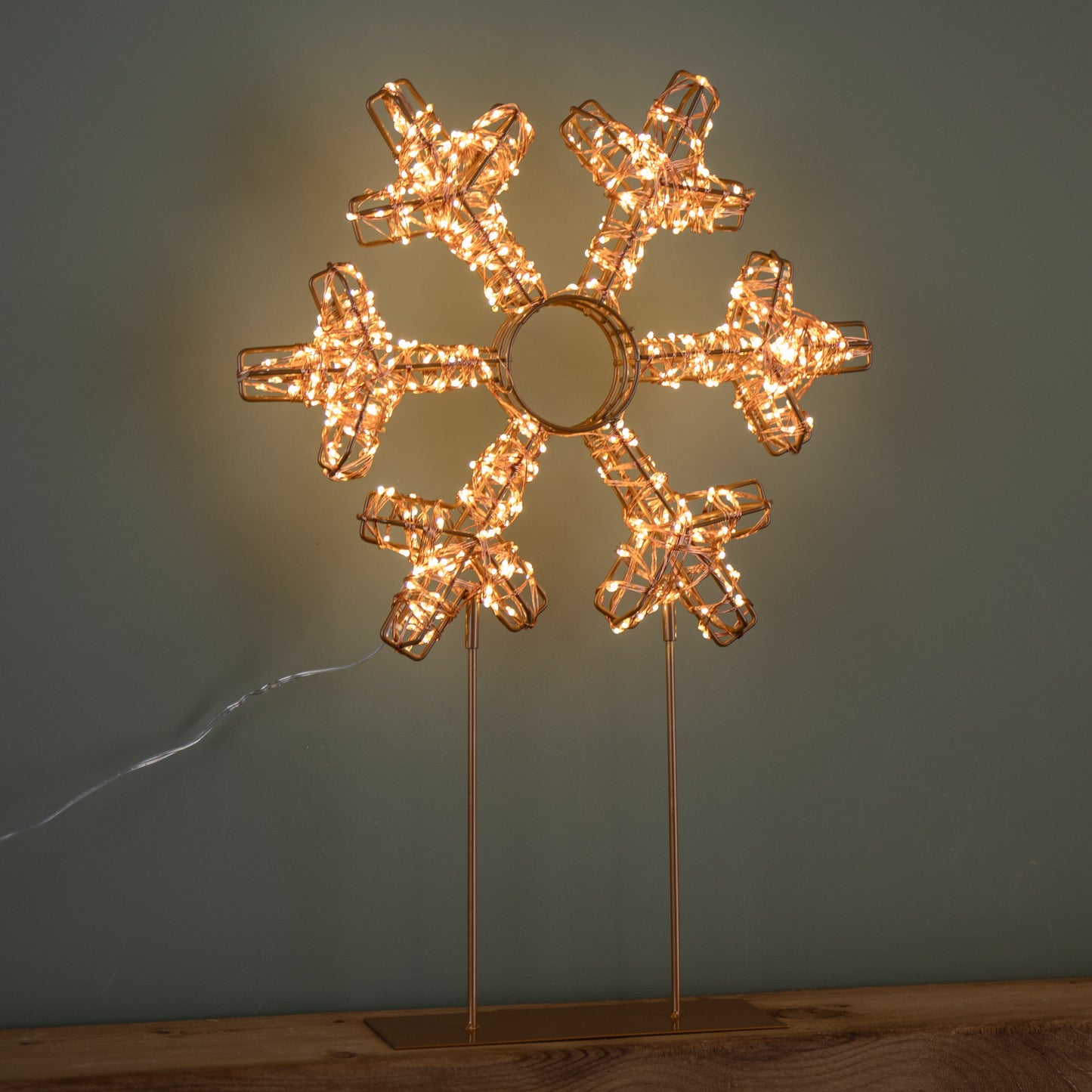 45cm Light up Rose Gold Christmas Snowflake on Metal Stand with Twinkling Warm White LEDs